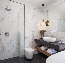 Luxury Beachfront Villa with Heated Infinity Pool near Trogir, Sleeps 8